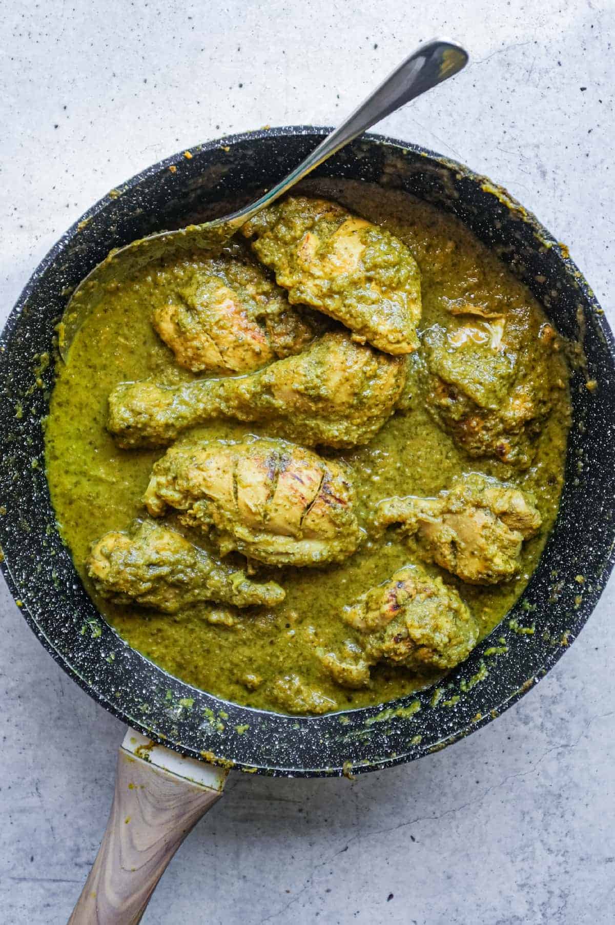 Juicy chicken coated in a vibrant green Chicken Cafreal masala from Goa.