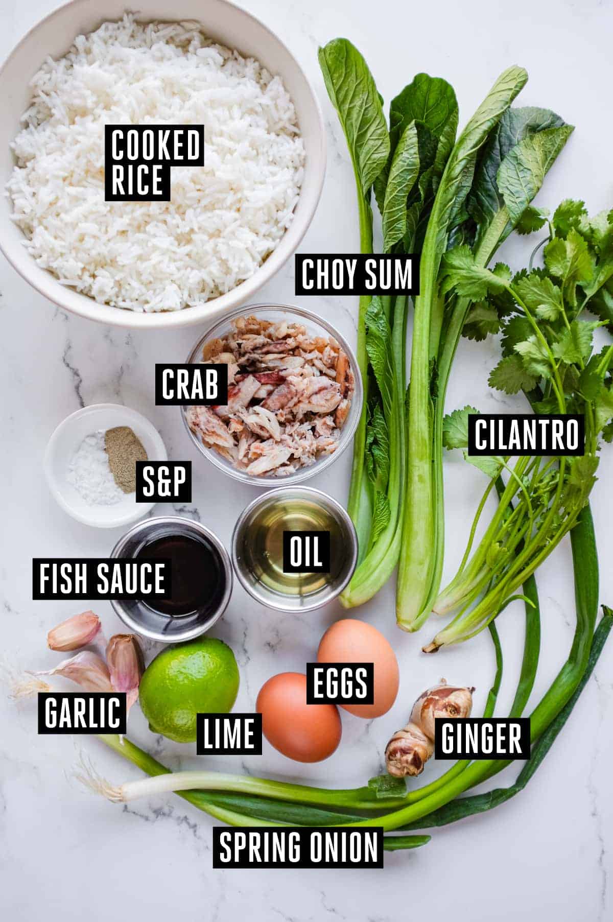 Vietnamese Crab Fried Rice | cookeatworld.com Ingredients for Vietnamese crab fried rice, including crabmeat, jasmine rice, eggs and greens