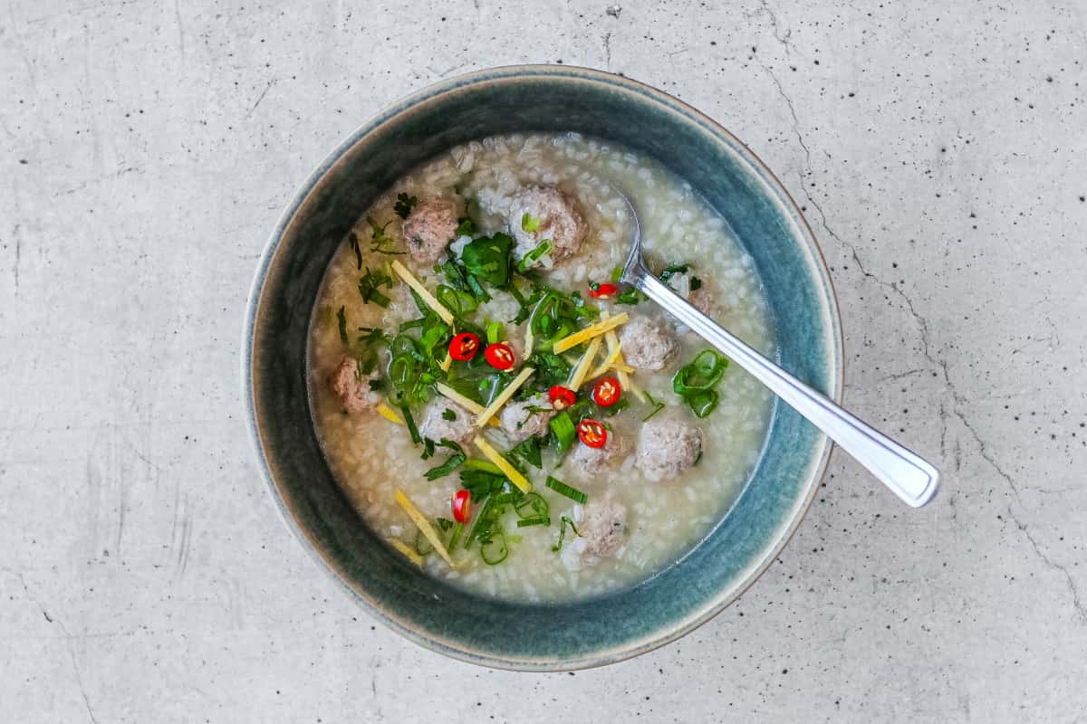 Comforting bowl of khao tom moo served as a traditional Thai-style breakfast