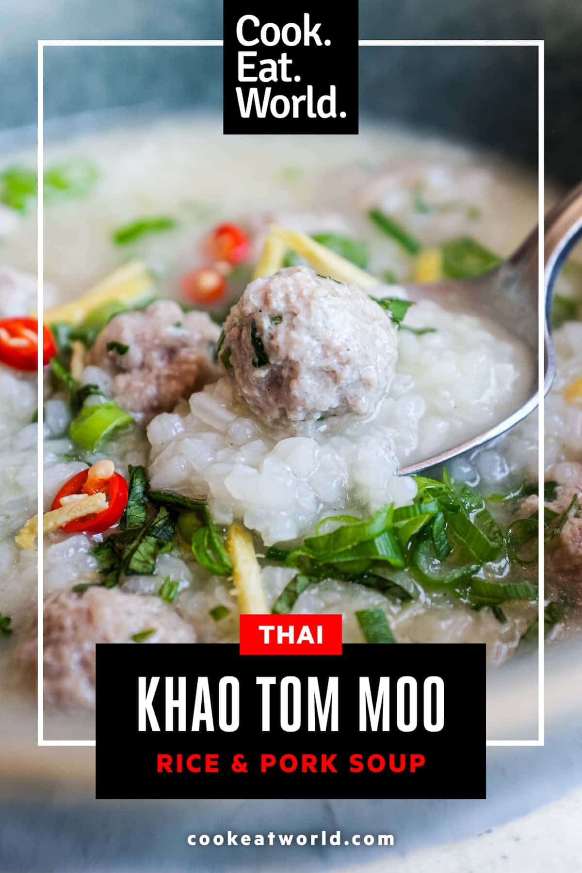 Bowl of Thai khao tom moo with pork meatballs, soft rice, coriander, ginger, chillies and sliced spring onions