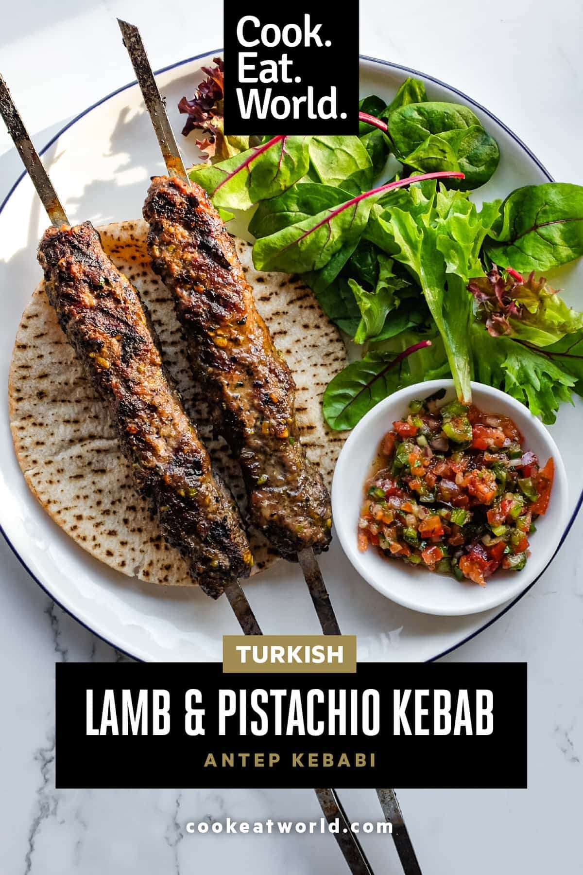 Authentic Antep Kebabı grilled until lightly charred and served with Turkish spoon salad.