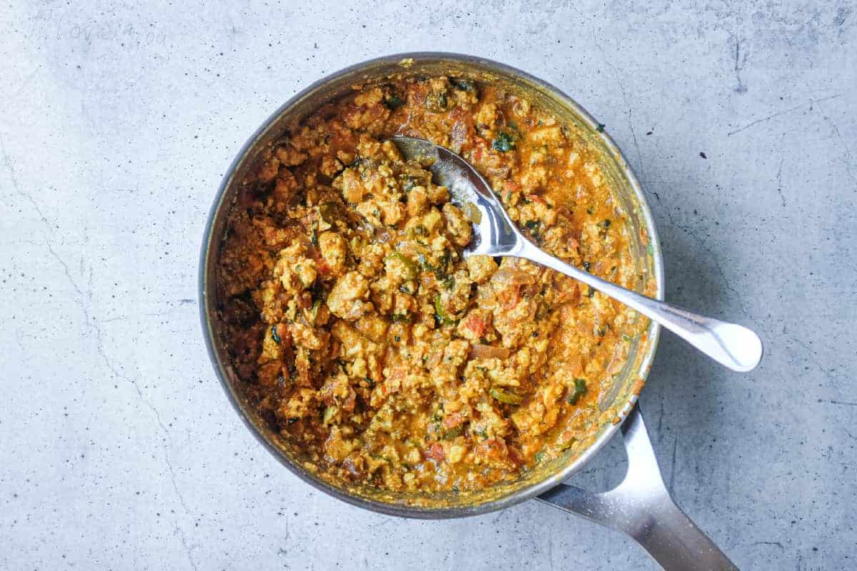 Close-up of authentic Paneer Bhurji with crumbled paneer and tomato masala.
