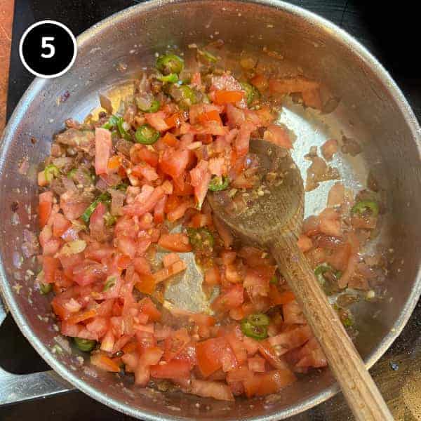 Paneer Bhurji (Indian Scrambled Paneer) | cookeatworld.com Tomato is added to the pan for the masala sauce of paneer bhurji