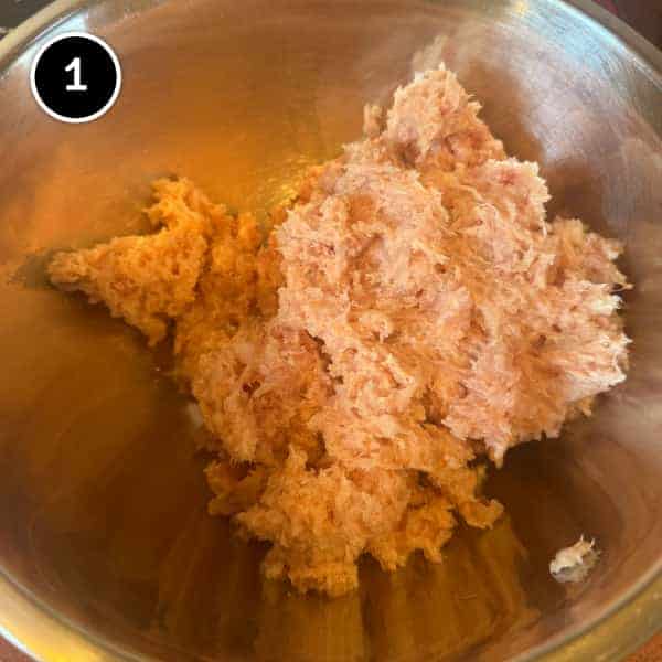 Tsukune (Japanese Chicken Meatballs) | cookeatworld.com Chicken thigh pieces being minced into a rough paste in a food processor