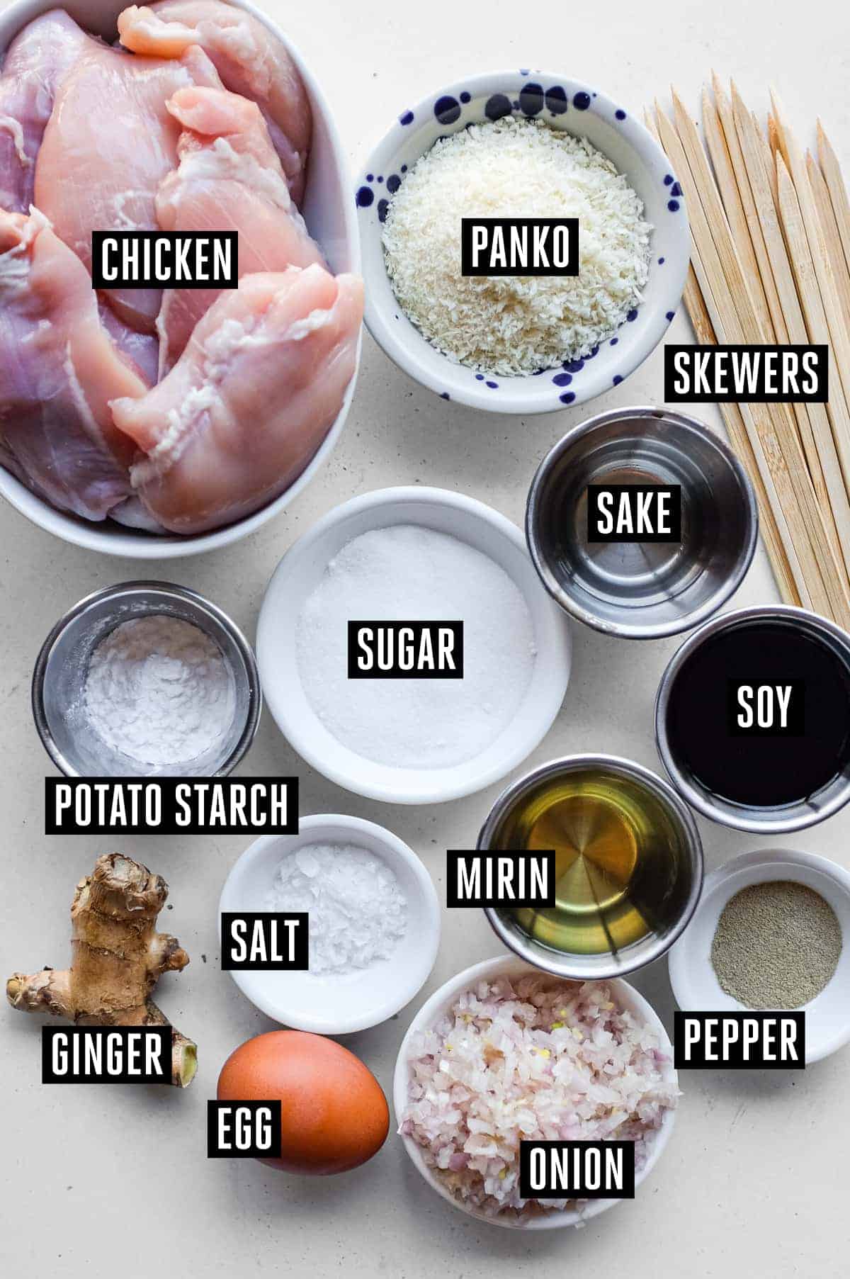 Tsukune (Japanese Chicken Meatballs) | cookeatworld.com Ingredients for Japanese tsukune including chicken thighs, onion, panko, egg, sake and soy sauce
