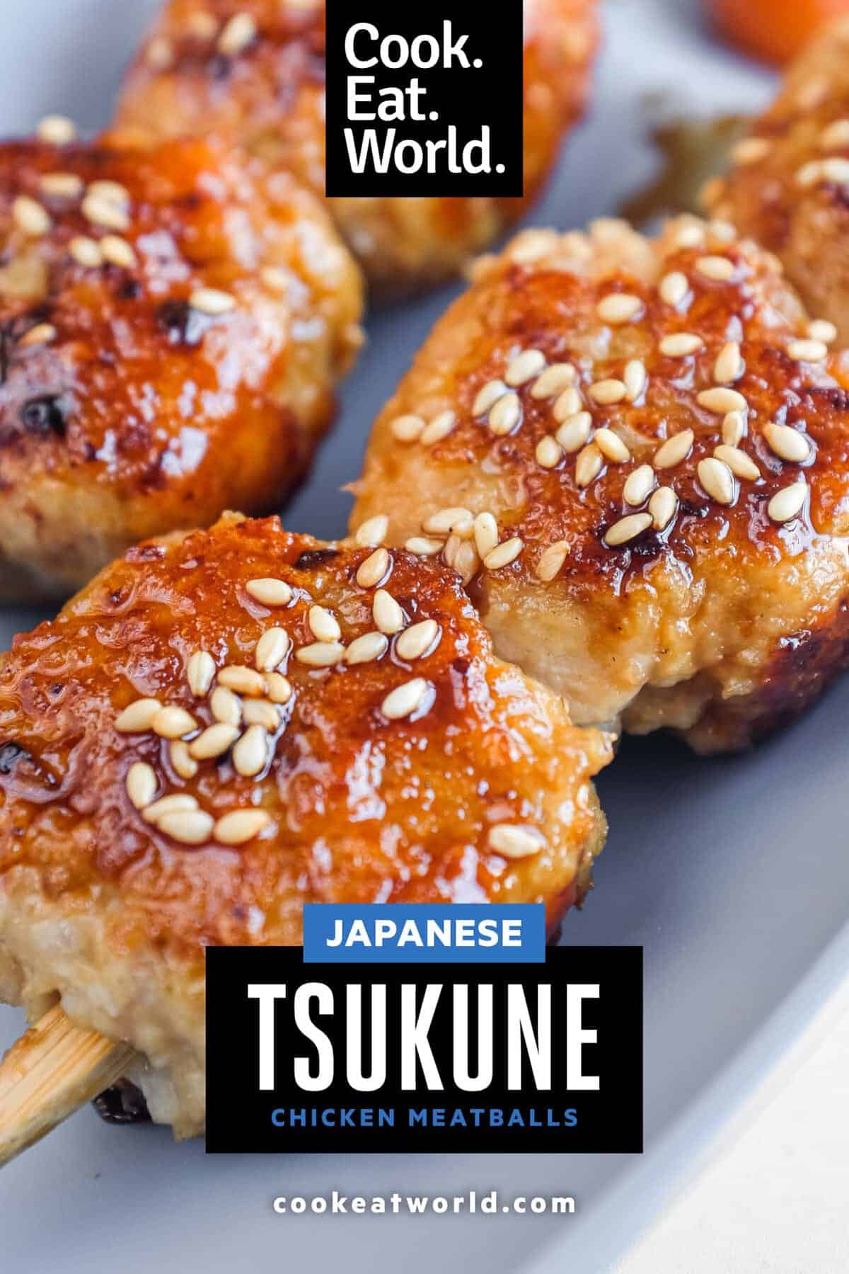 Close-up of juicy Japanese chicken meatballs coated in a glossy sweet and savoury tare sauce