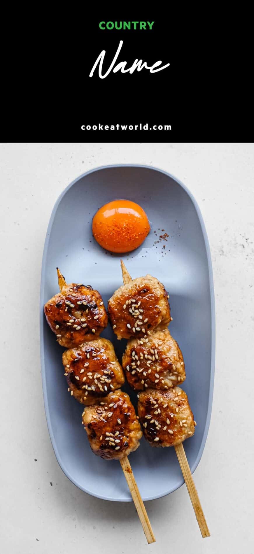 Japanese tsukune chicken meatball skewers glazed with tare and sprinkled with toasted sesame seeds