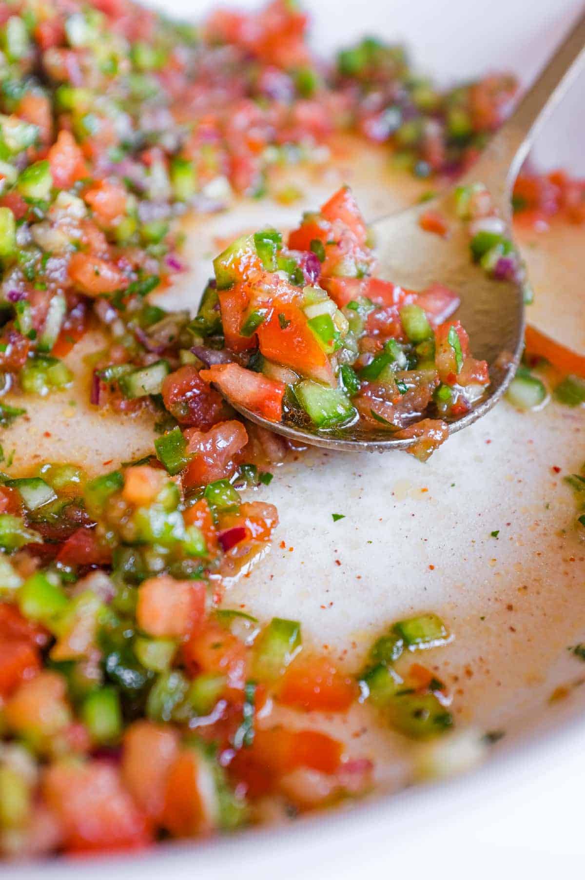 Authentic Turkish spoon salad bursting with fresh vegetables and herbs in a vibrant citrus dressing.