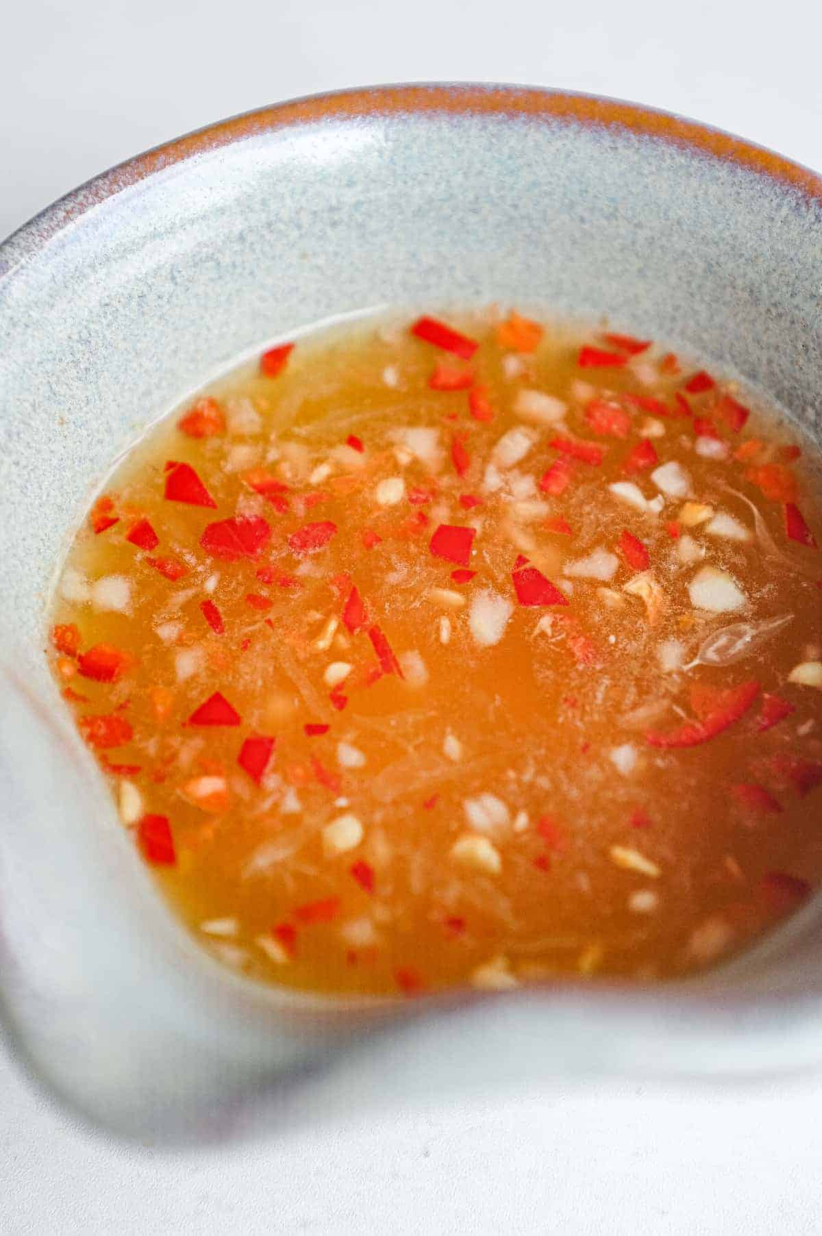 Fish sauce, lime, sugar, garlic and chilli for making nuoc cham