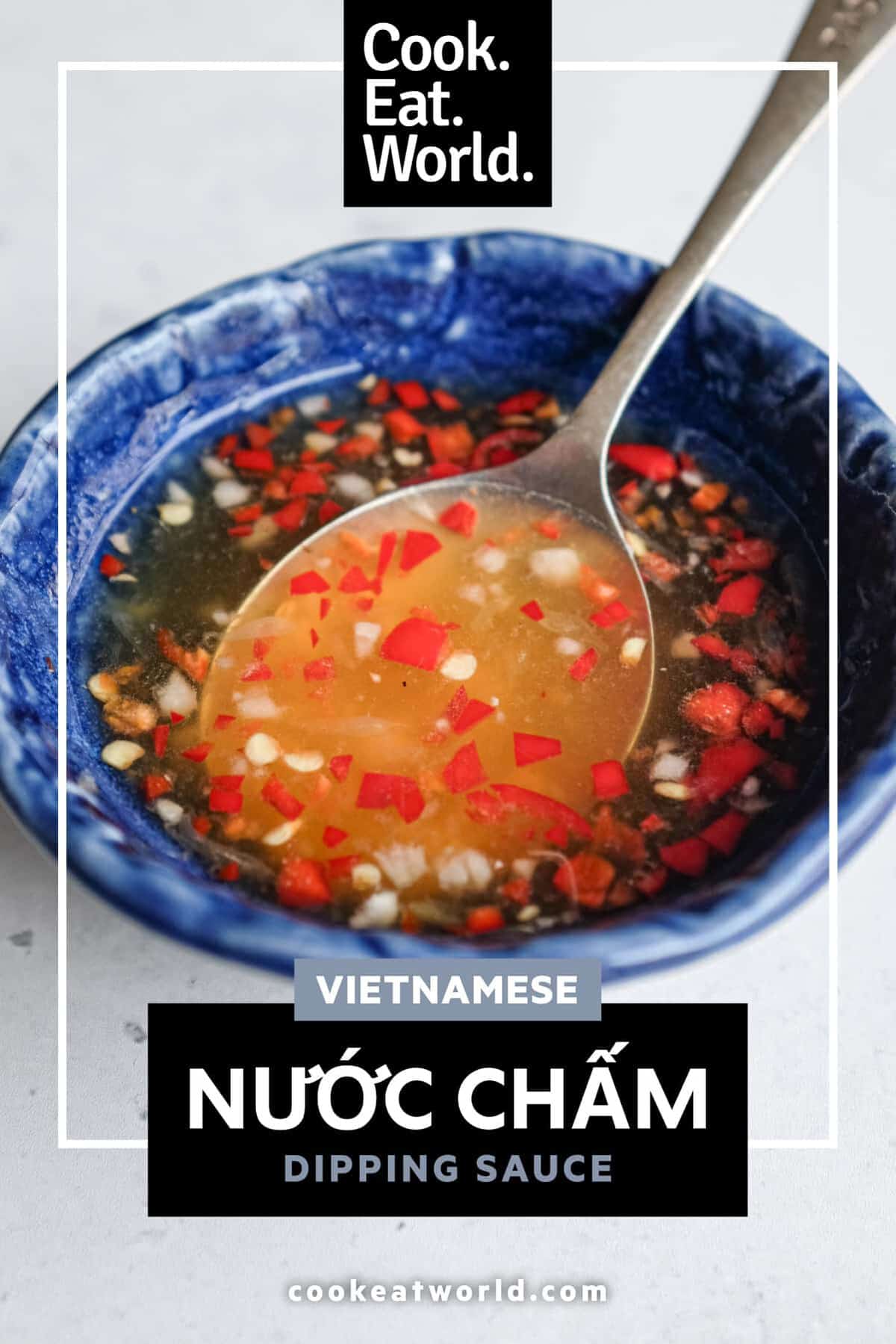 Freshly chopped garlic and red chilli in Vietnamese dipping sauce