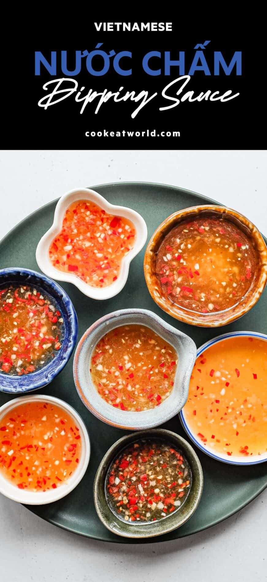 Homemade nuoc cham Vietnamese dipping sauce with chopped red chilli in a selctions of beautiful small bowls