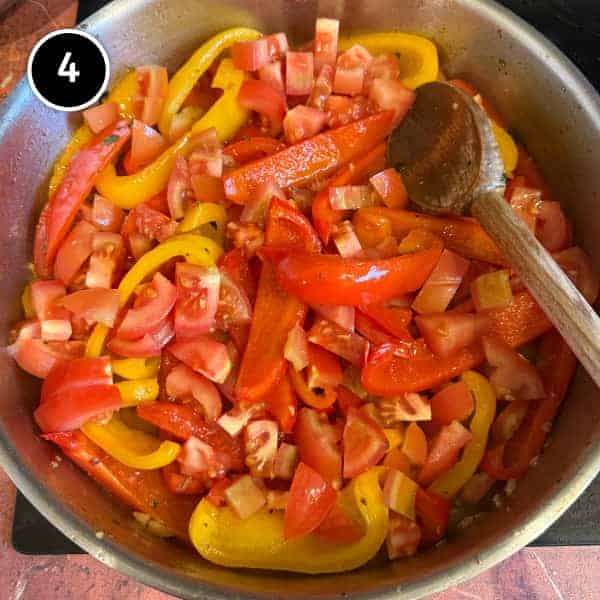 Roman Chicken (Pollo Alla Romana) | cookeatworld.com Peppers and tomatoes simmering for the sauce of Pollo Alla Romana