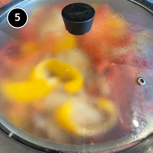 Roman Chicken (Pollo Alla Romana) | cookeatworld.com Pollo Alla Romana simmering with the lid on.