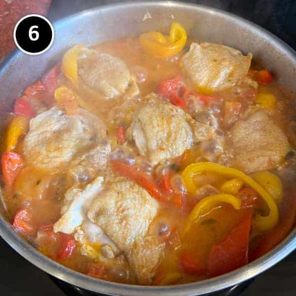Roman Chicken (Pollo Alla Romana) | cookeatworld.com Pollo Alla Romana simmering in a pan to reduce the sauce.